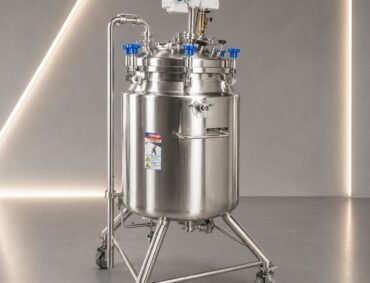 Cryogenic Chamber.jpg Stainless steel cryogenic vessel with pipework on a wheeled frame